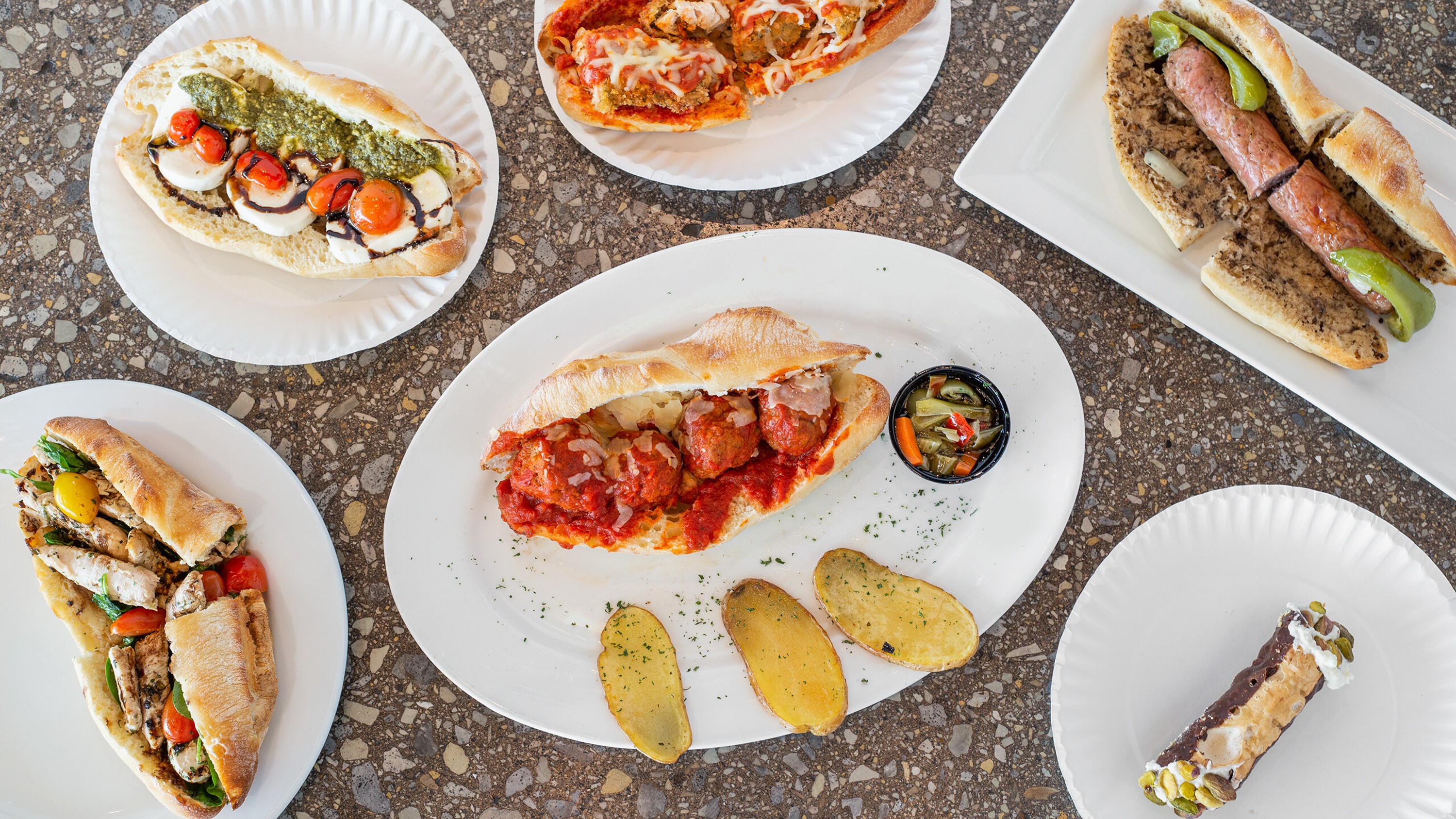 Chef Ciccio sandwiches, sides, and cannoli spread
